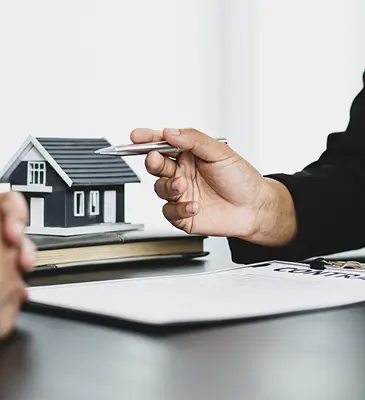 Financial advisor from SL Capital explaining the intricacies of home owner succession policy