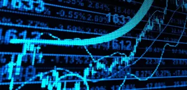 Financial data from SL Capital being examined on a computer screen.